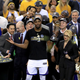 Kevin Durant of the Golden State Warriors celebrates with the Bill Russell NBA Finals Most Valuable Player Award after defeating the Cleveland Cavaliers 129-120 in Game 5 to win the 2017 NBA Finals at Oracle Arena on June 12, 2017, in Oakland, Calif. (Ronald Martinez/Getty Images)